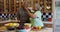 Mature black couple cooking together in kitchen