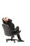 Mature businessman resting in armchair