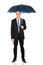 Mature businessman with umbrella