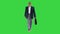 Mature businessman walking in a hurry and looking at watch on a Green Screen, Chroma Key.