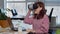 Mature businesswoman enjoying using virtual reality headset at her workplace