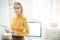 Mature Businesswoman Standing Behind Glass