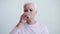 Mature Caucasian Woman Drinking Water from a Glass