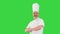 Mature chef with beard and in white uniform dancing on a Green Screen, Chroma Key.