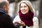 Mature couple chatting in street