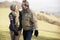 Mature couple on country walk in winter