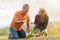 Mature Couple Cultivating Vegetables