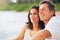 Mature Couple Enjoying Sunset on the Beach