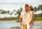 Mature Couple Enjoying Sunset on the Beach