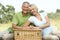 Mature couple having picnic in countryside