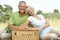 Mature couple having picnic in countryside