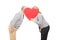 Mature couple hiding behind a heart shaped cardboard