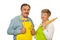 Mature couple holding kitchen utensils