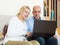 Mature couple with laptop