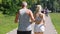 Mature couple running outside in slow motion