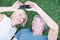 Mature, couple and selfie smile on grass from above in garden backyard for social media post, memory or travel. Man