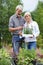 Mature Couple Shopping At Garden Center