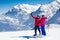 Mature couple skiing in the mountains