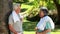 Mature couple wiping their foreheads with towels