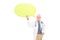 Mature doctor holding a big yellow speech bubble