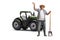 Mature farmer with a shovel standing next to a green tractor and waving