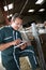 Mature farmer using tablet in barn