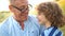 Mature father and son is a schoolboy. Late child. Closeup portrait of a happy grandfather and grandson. Happy Family