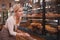 Mature female baker working at her shop