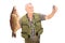 Mature fisherman holding a fish and taking selfie