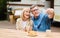 Mature husband and wife taking selfie during breakfast at campground