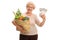 Mature lady holding groceries and money