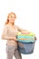 Mature lady holding a laundry basket