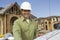 Mature Male Architect Wearing Hardhat