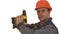 Mature male constrution worker posing with a drill machine