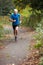 Mature Male Jogger Running Along Path