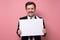 Mature man with funny mustache in business suit with blank sign