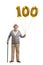 Mature man holding a golden number hundred balloon and a cane