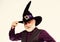 Mature man magician in witch hat. bearded man ready for halloween party. evil wizard. Stargazer or astrologer. halloween