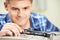 Mature Man Putting Vinyl Record On Player