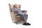 Mature man sleeping in an armchair