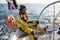 Mature Man Wearing Wind Jacket On Sailing Boat