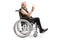 Mature man in a wheelchair making a rock and roll hand sign and looking at the camera