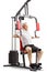 Mature man working out on a multifunctional exercise machine