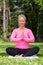 Mature Middle Aged Fit Healthy Woman Practicing Yoga Outside