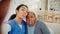 Mature patient, nurse and selfie of happy people laughing, talking and post tongue out photo to online healthcare app