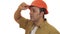 Mature professional builder in hardhat looking disappointed