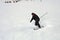 Mature skier fallen during downhill at ski resort in winter. Accident at ski slope due to unfasten ski binding. Extreme winter