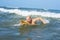 Mature surfer ready to catch a wave