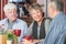 Mature Trio in Coffee House