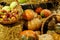 Mature vegetables. Gifts of fall. Pumpkins, apple. Background